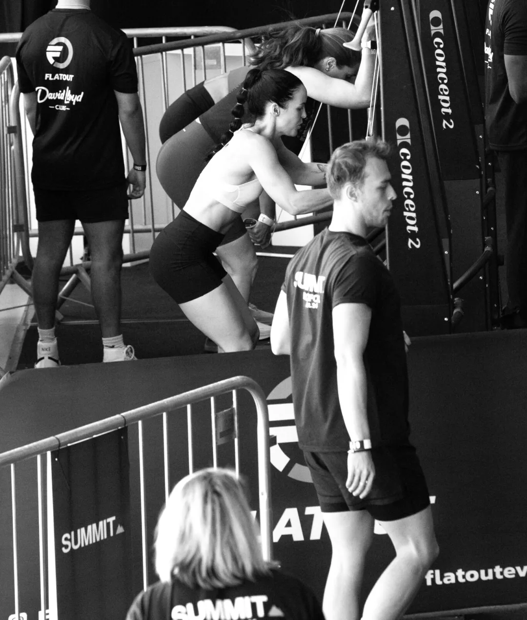 Doubles participants working through the SkiErg zone at a FLATOUT event
